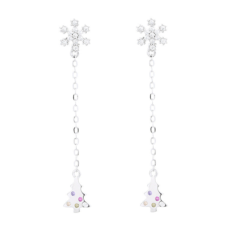 Women’s earrings with sparkling snowflake pendant and chain embellishment