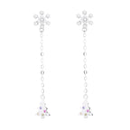 Women’s earrings with sparkling snowflake pendant and chain embellishment
