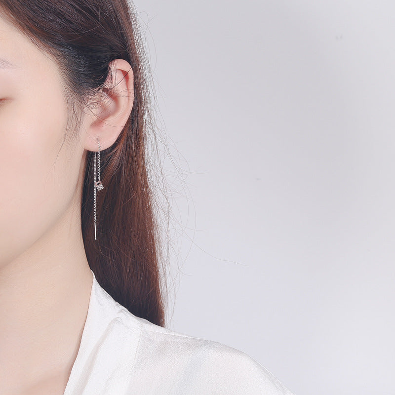 Women's earrings with elegant square pendant and shimmering zirconia