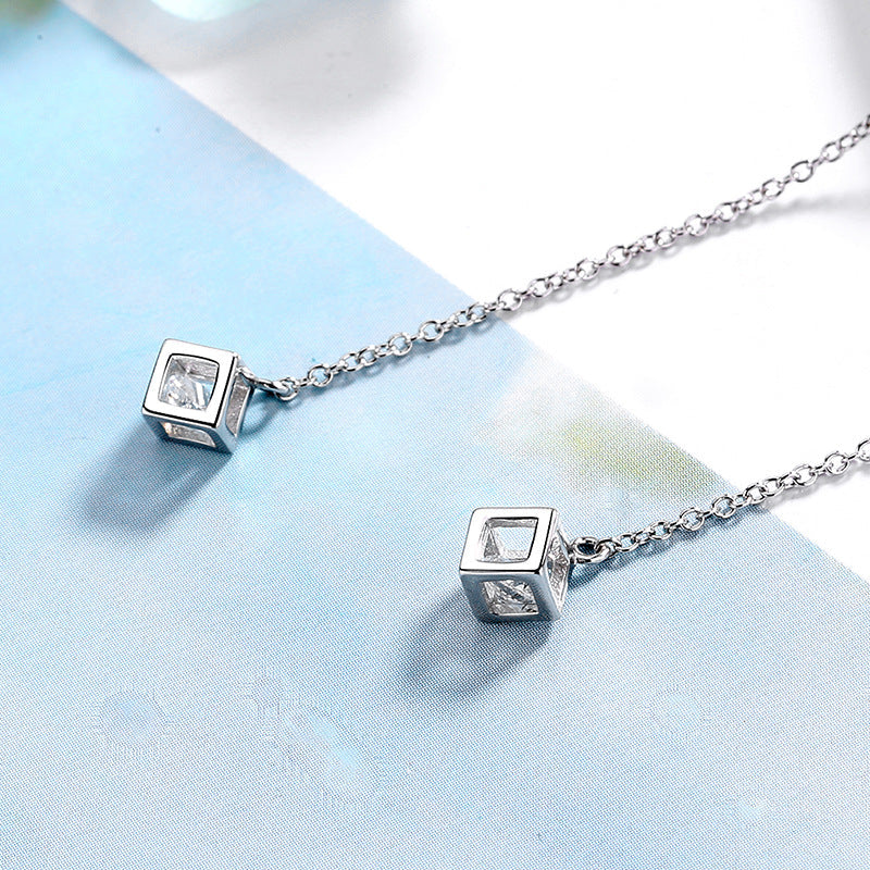 Women's earrings with elegant square pendant and shimmering zirconia