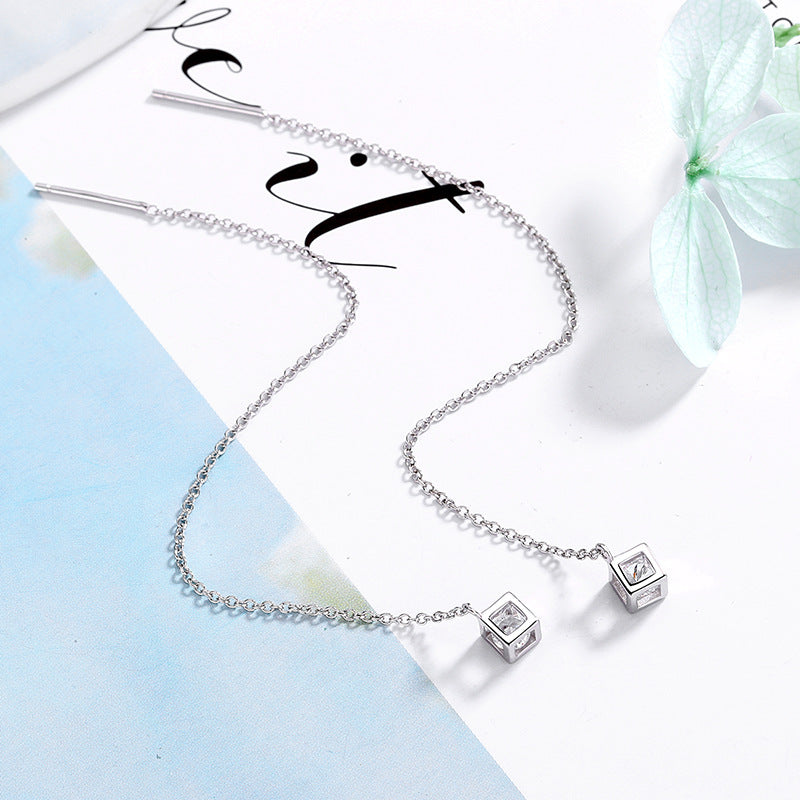 Women's earrings with elegant square pendant and shimmering zirconia