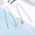 Women's earrings with elegant square pendant and shimmering zirconia