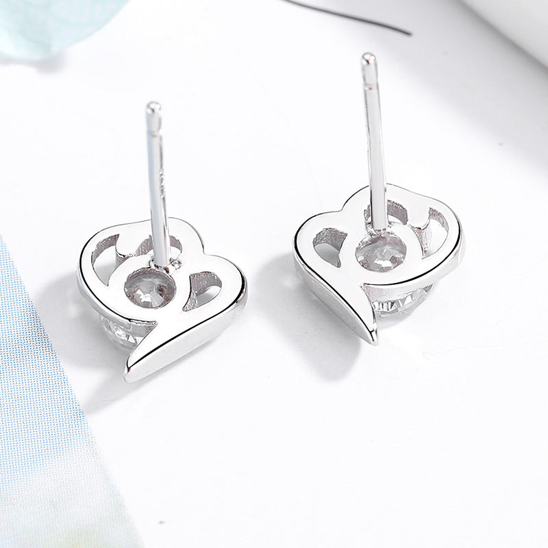 Women’s stud earrings with stylish heart design and sparkling crystals