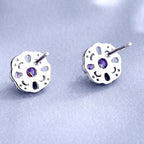 Women's stud earrings with delicate flower design and sparkling crystals