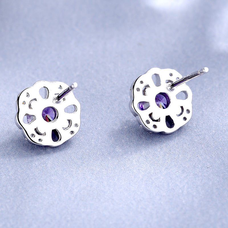Women's stud earrings with delicate flower design and sparkling crystals