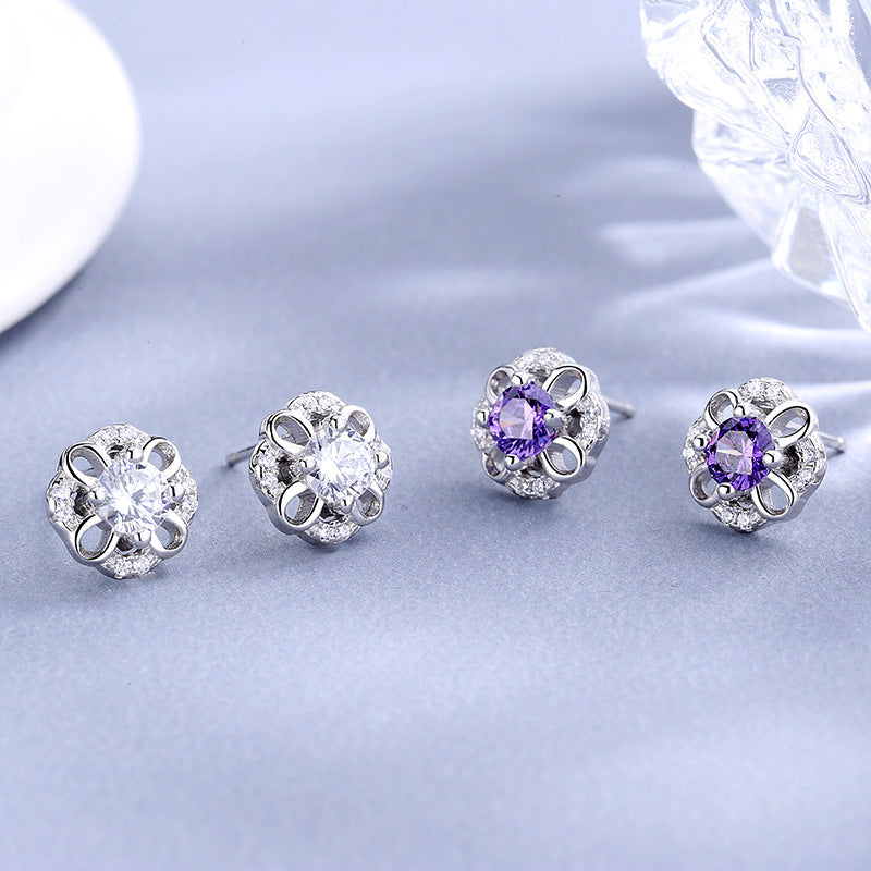 Women's stud earrings with delicate flower design and sparkling crystals