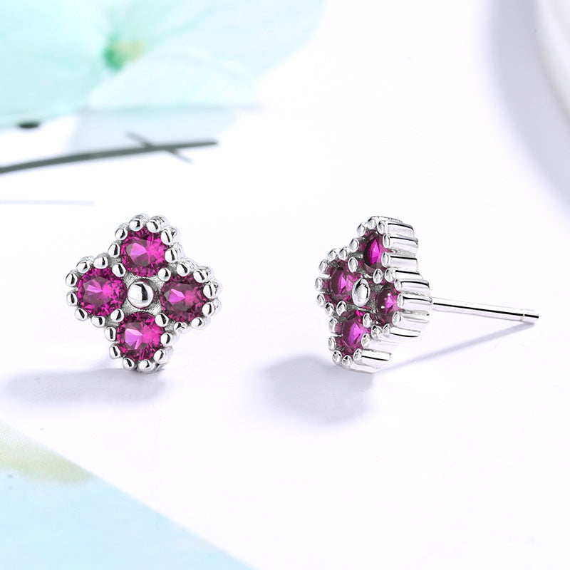Women's earrings with multilayer floral design and sparkling zirconia