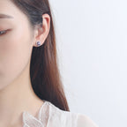 Women's earrings in heart-shaped design with sparkling zirconia
