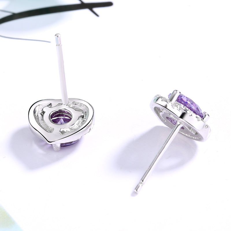 Women's earrings in heart-shaped design with sparkling zirconia