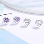 Women's earrings in heart-shaped design with sparkling zirconia