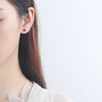 Women's earrings with sparkling heart accents made of high-quality stainless steel