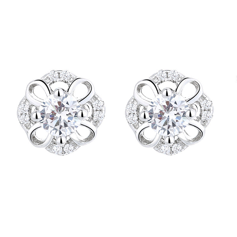 Women's stud earrings with delicate flower design and sparkling crystals