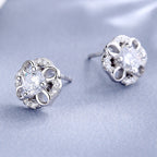 Women's stud earrings with delicate flower design and sparkling crystals