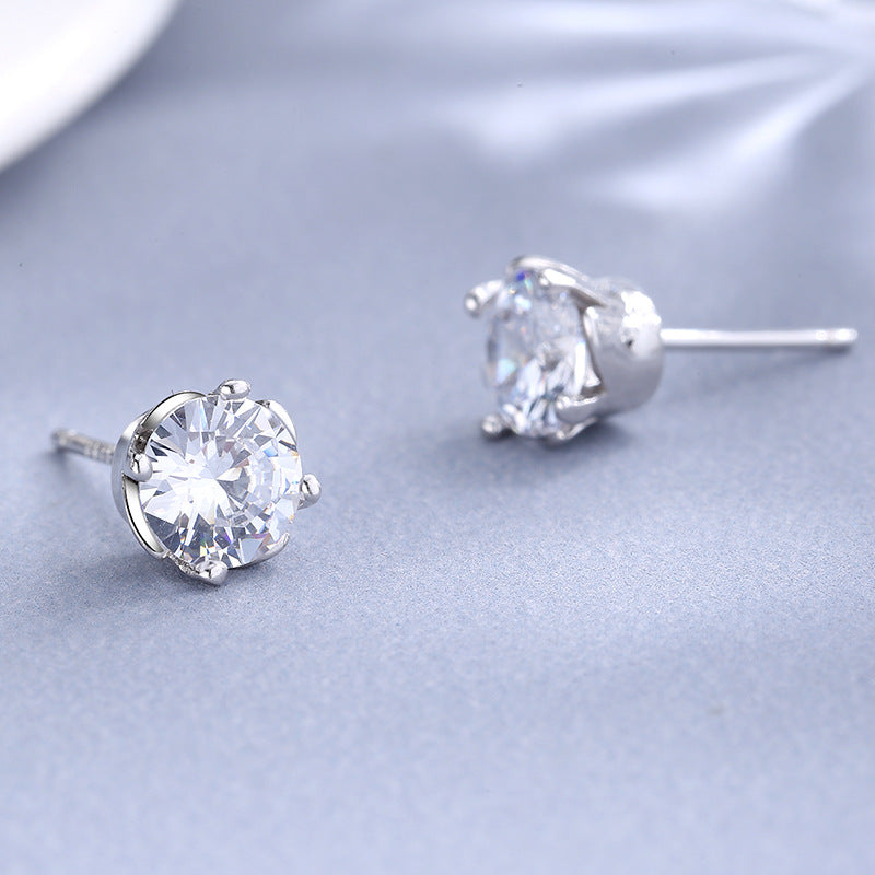 Ladies earrings with sparkling crystals in exquisite wreath design