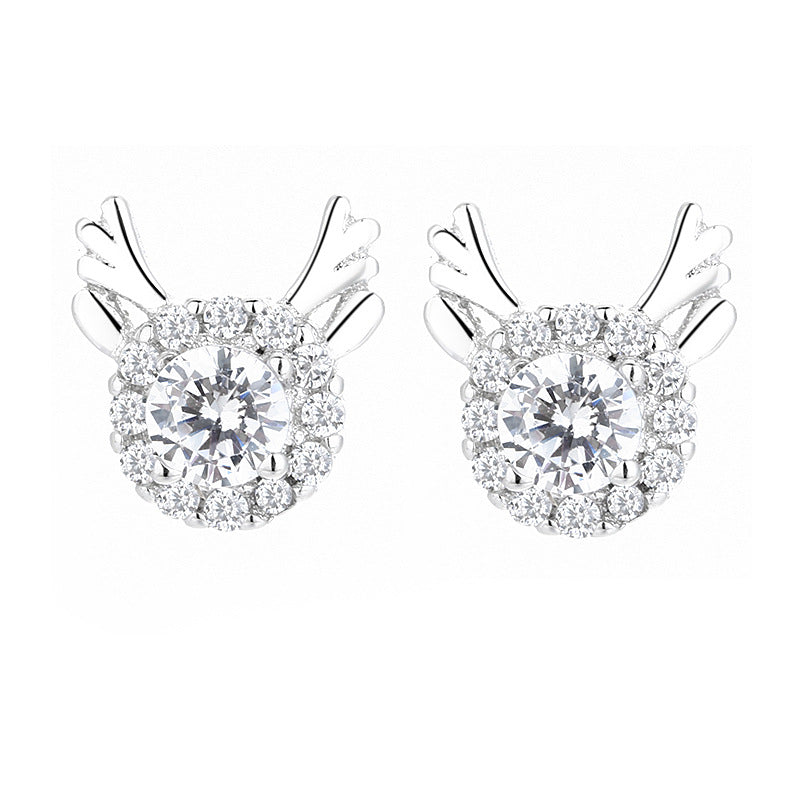 Women's earrings with sparkling crystals and playfully designed wings