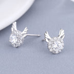 Women's earrings with sparkling crystals and playfully designed wings