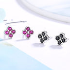 Women's earrings with multilayer floral design and sparkling zirconia