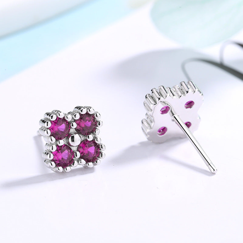 Women's earrings with multilayer floral design and sparkling zirconia