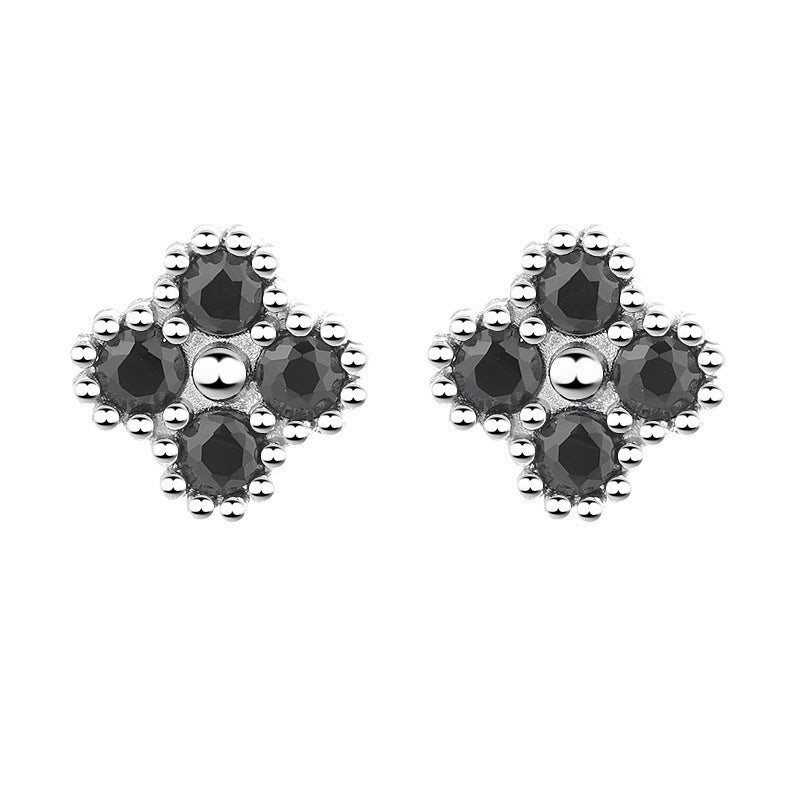 Women's earrings with multilayer floral design and sparkling zirconia
