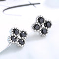 Women's earrings with multilayer floral design and sparkling zirconia