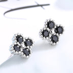 Women's earrings with multilayer floral design and sparkling zirconia