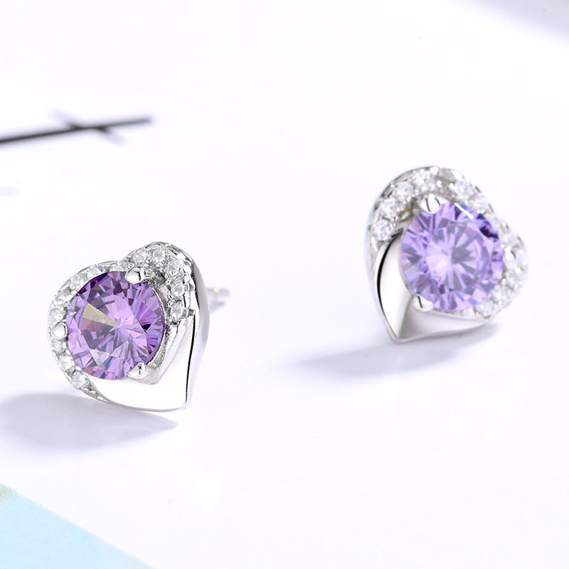Women's earrings in heart-shaped design with sparkling zirconia