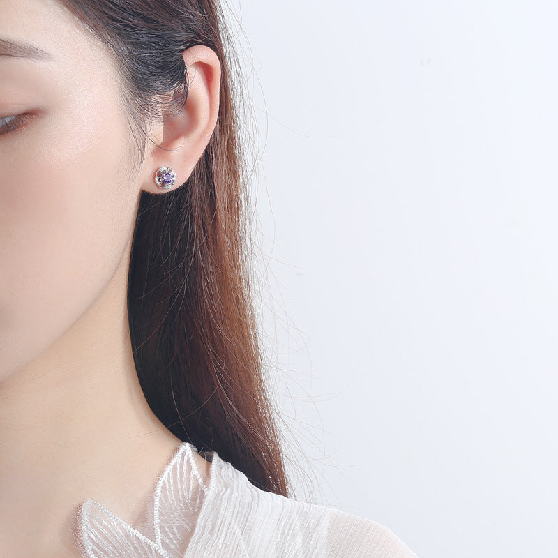Women's stud earrings with delicate flower design and sparkling crystals