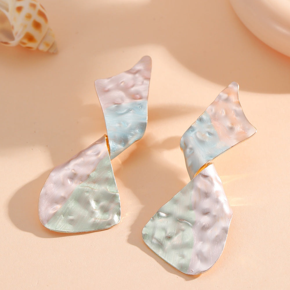 Ladies earrings in modern disc design
