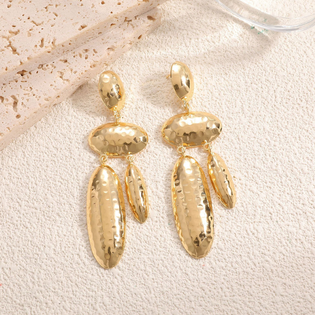 Women Hanging Earrings with artistic, three-dimensional design