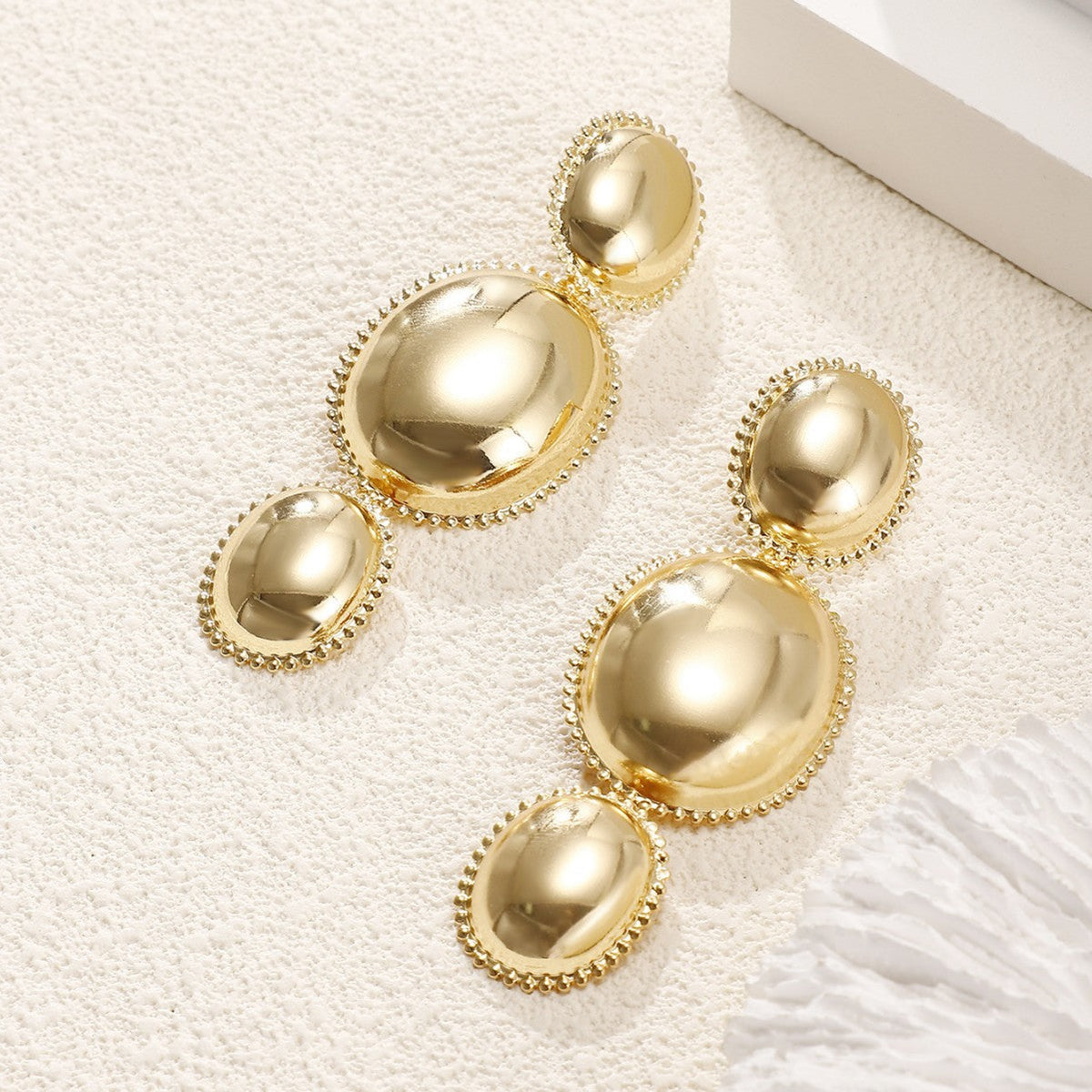 Women's earrings in artistic, structured design