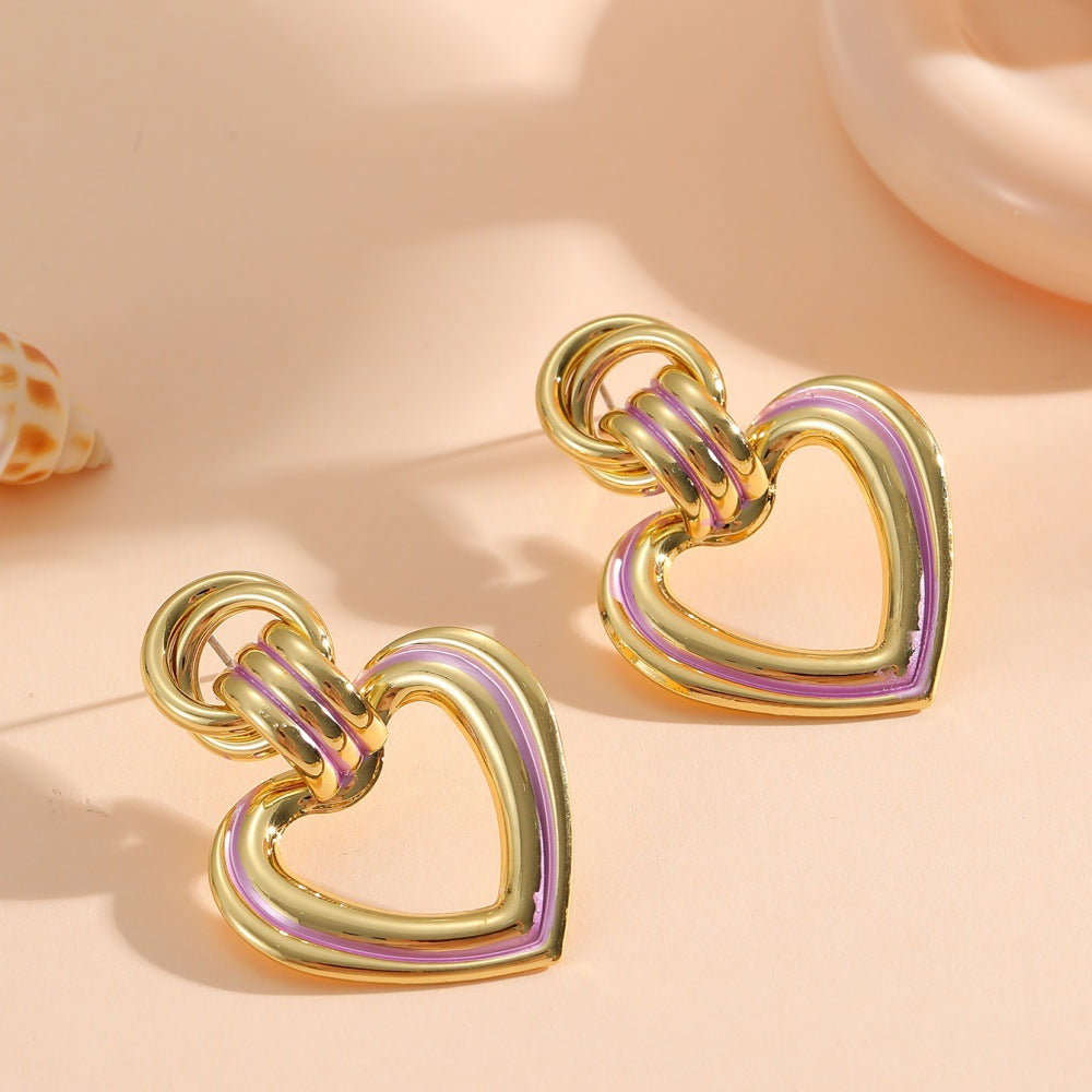Women’s earrings in modern heart design
