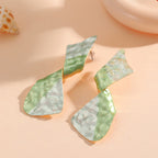 Ladies earrings in modern disc design