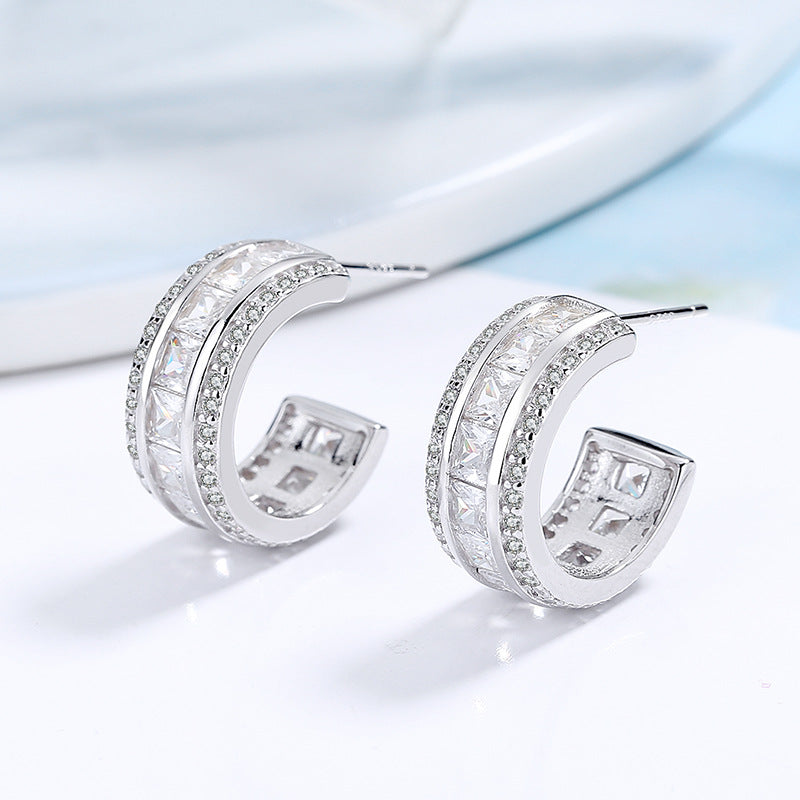 Women's stud earrings with elegant crystal and zirconia embellishment
