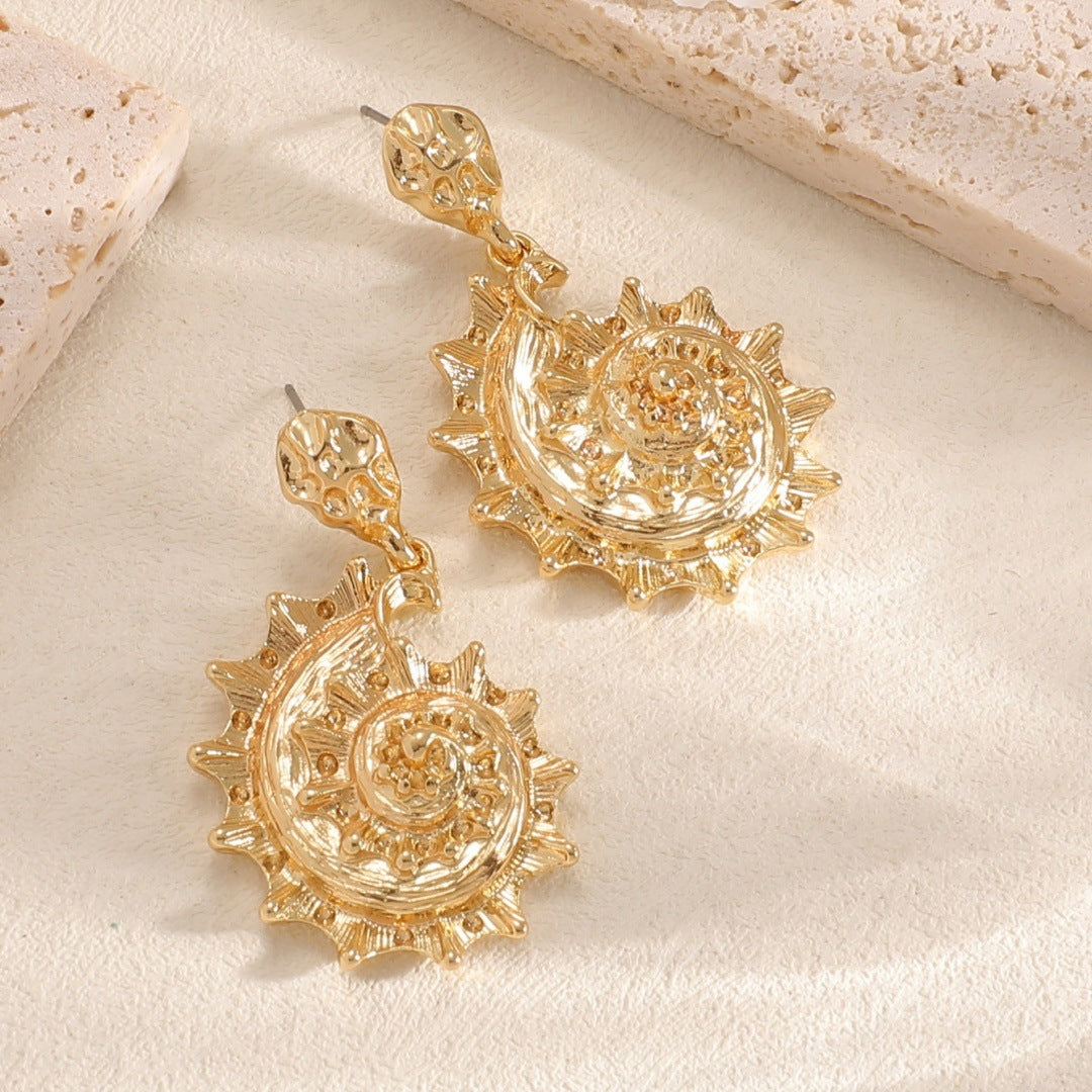 Ladies earrings in shell design