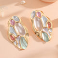 Ladies ear clips with elaborate, colorful shell design