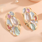 Ladies ear clips with elaborate, colorful shell design