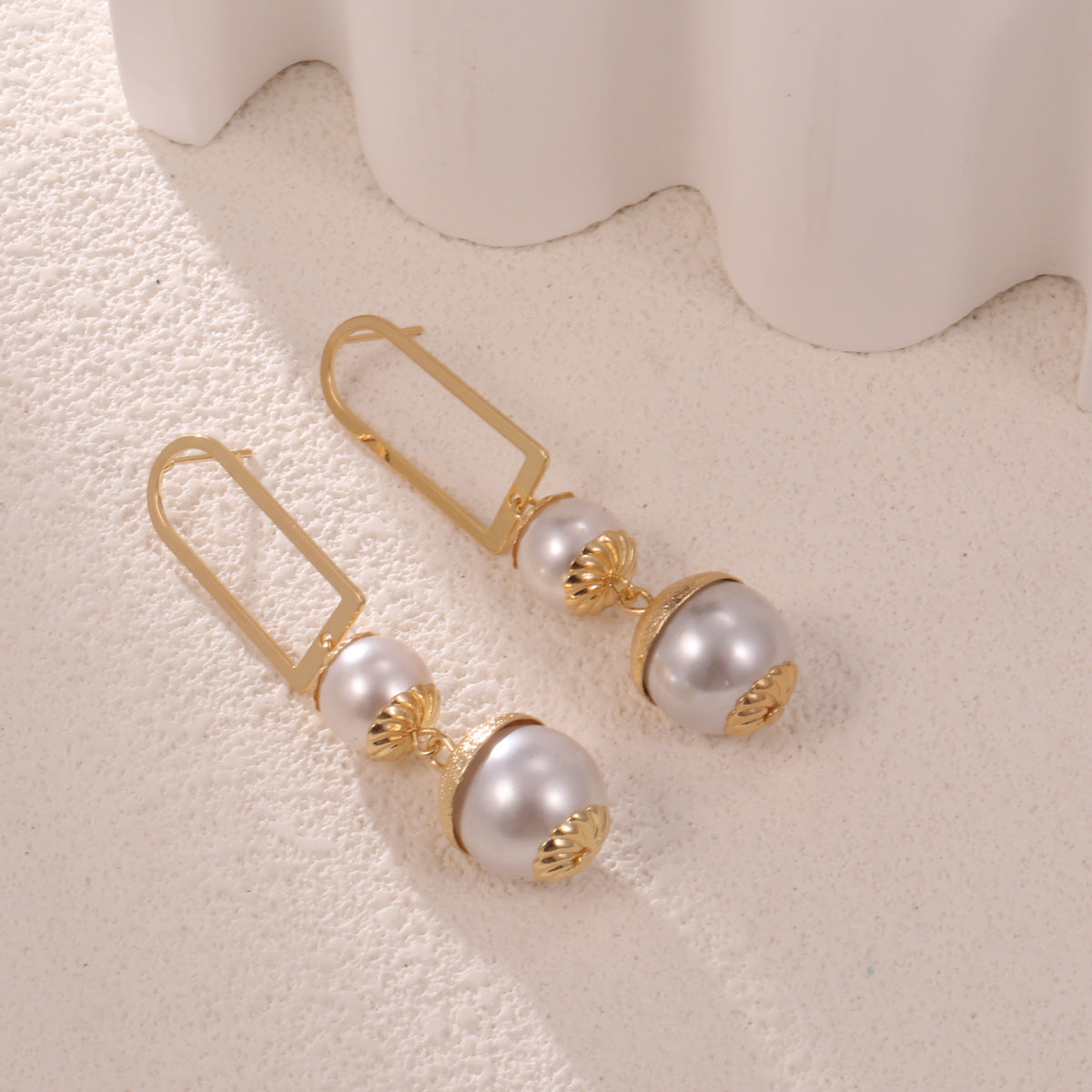 Ladies earrings with elegant pearl design