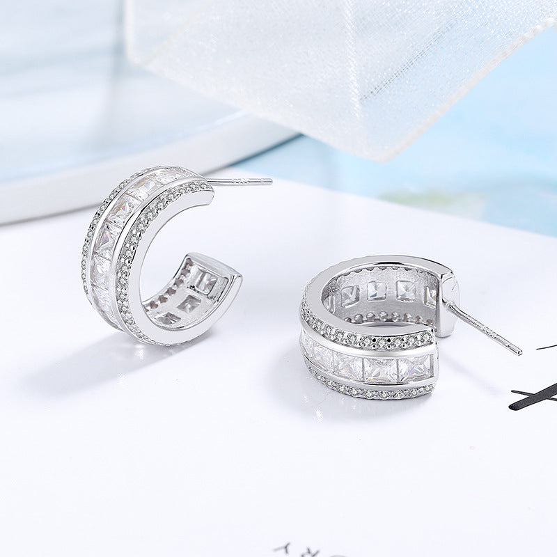 Women's stud earrings with elegant crystal and zirconia embellishment