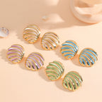 Women's ear clips in maritime shell design