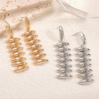 Ladies Hanging Earrings in Modern Spiral Design