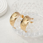 Women's bangles made of high-quality metal with an elegant wave pattern