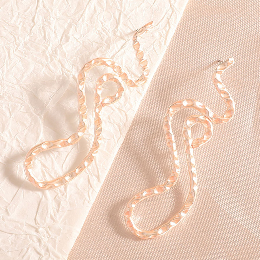 Ladies earrings in elegant wave pattern