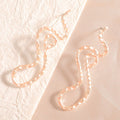 Ladies earrings in elegant wave pattern
