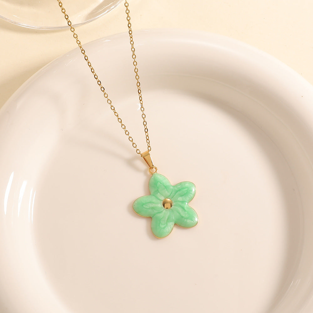 Women’s necklace with elaborately designed flower pendant