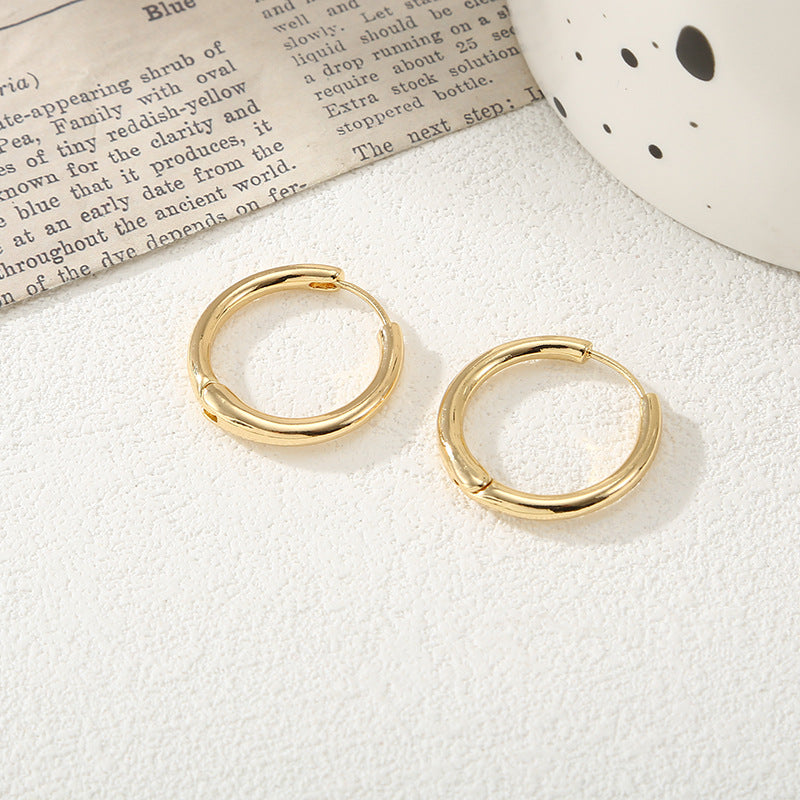 Women's hoop earrings with modern, textured design