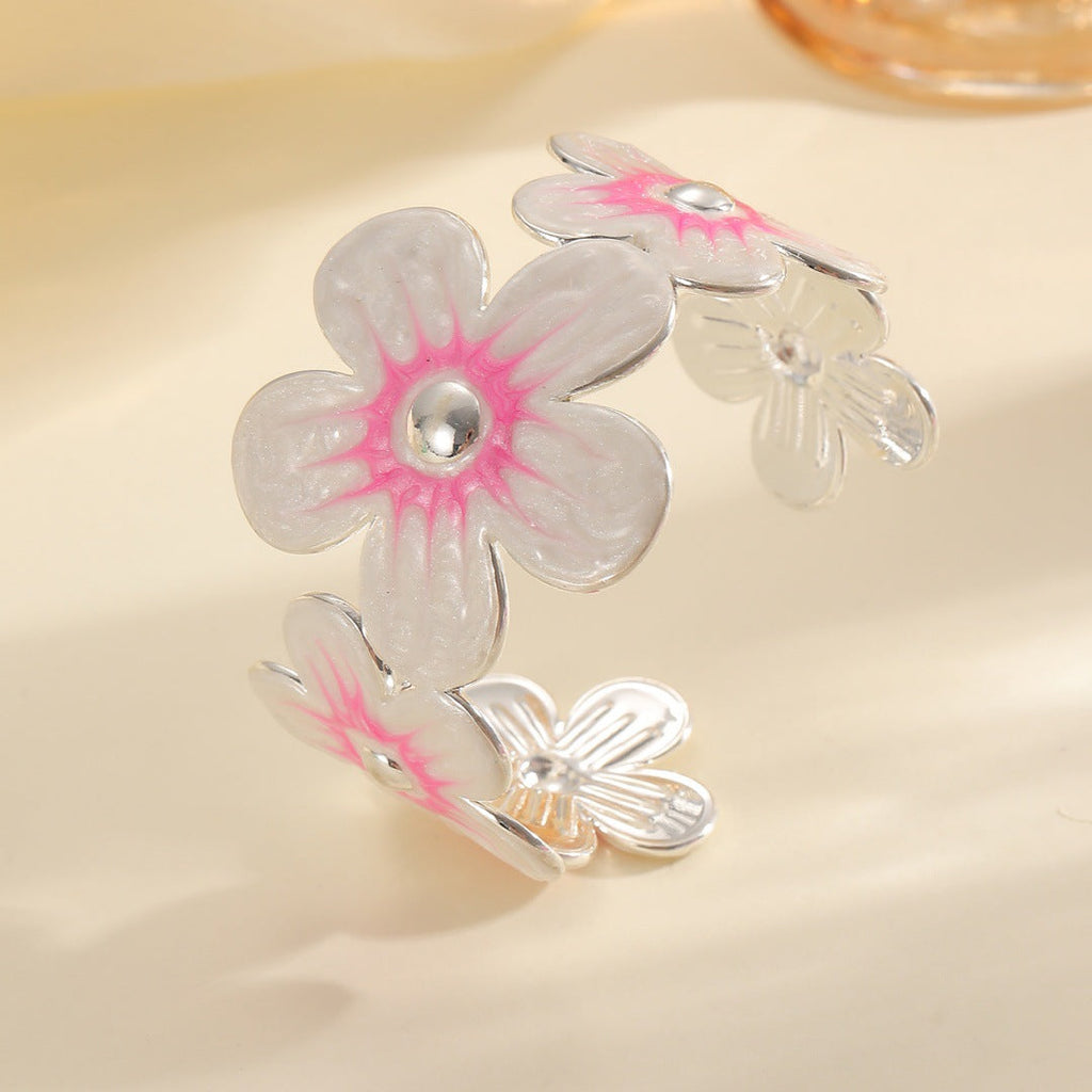 Women's bracelet made of high-quality metal with floral design