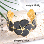 Ladies cuff bracelet with elaborate flower pattern