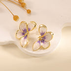 Women's ear clips in elegant floral design with a glossy coating