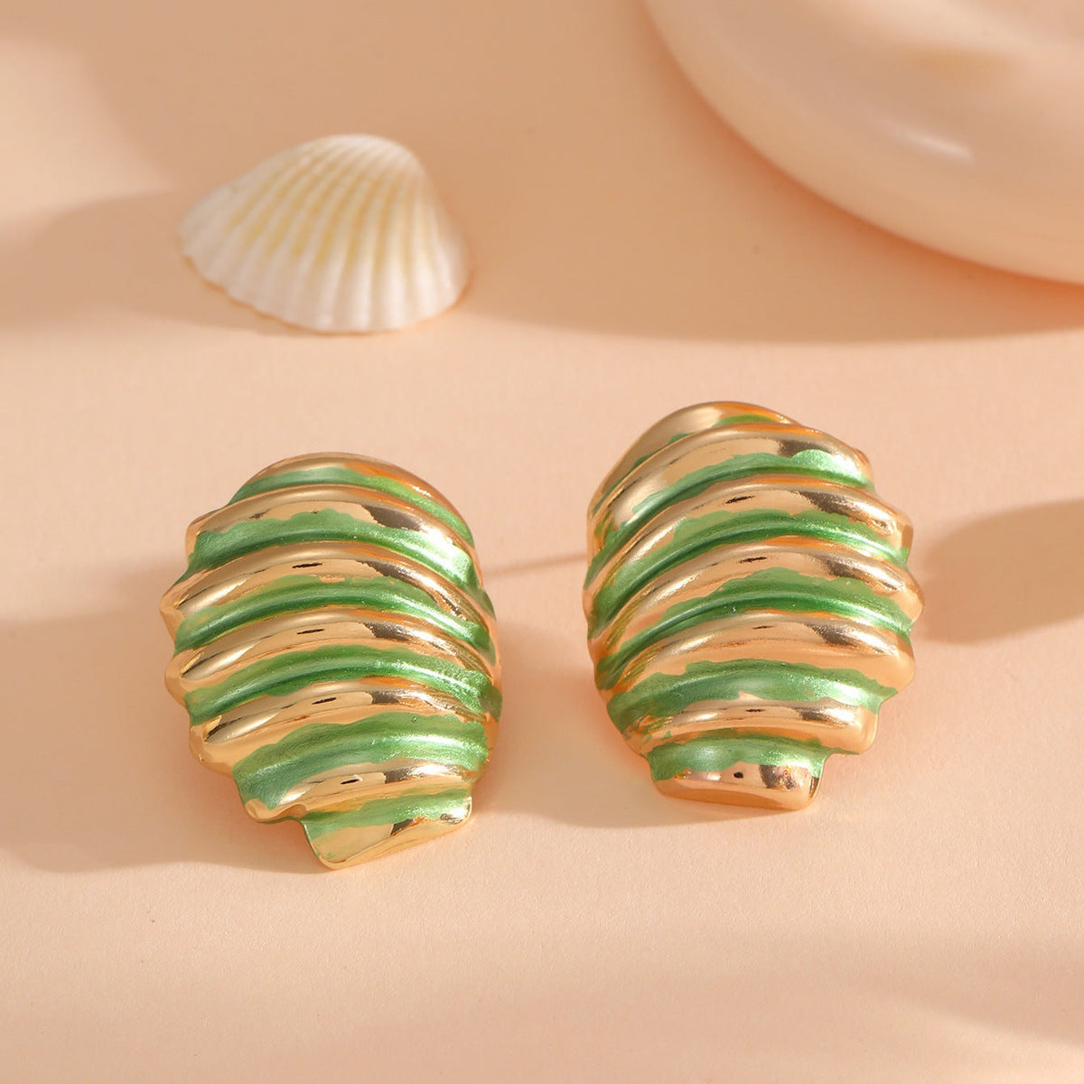 Women's ear clips in maritime shell design