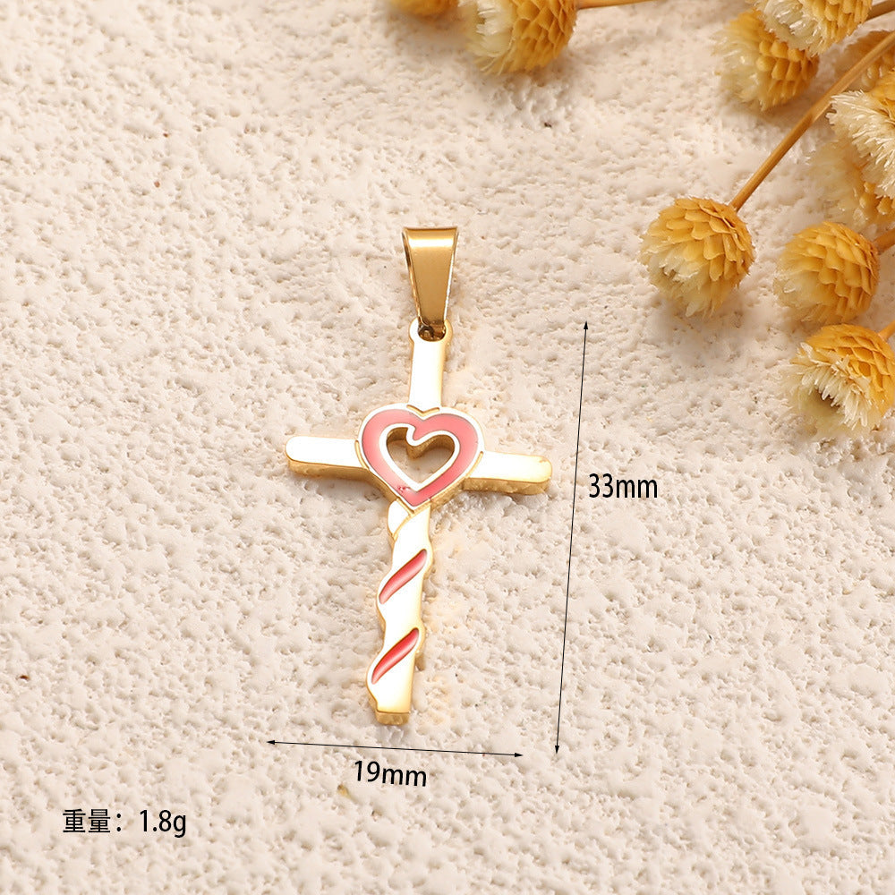 Ladies cross pendant with heart-shaped design and sparkling accents